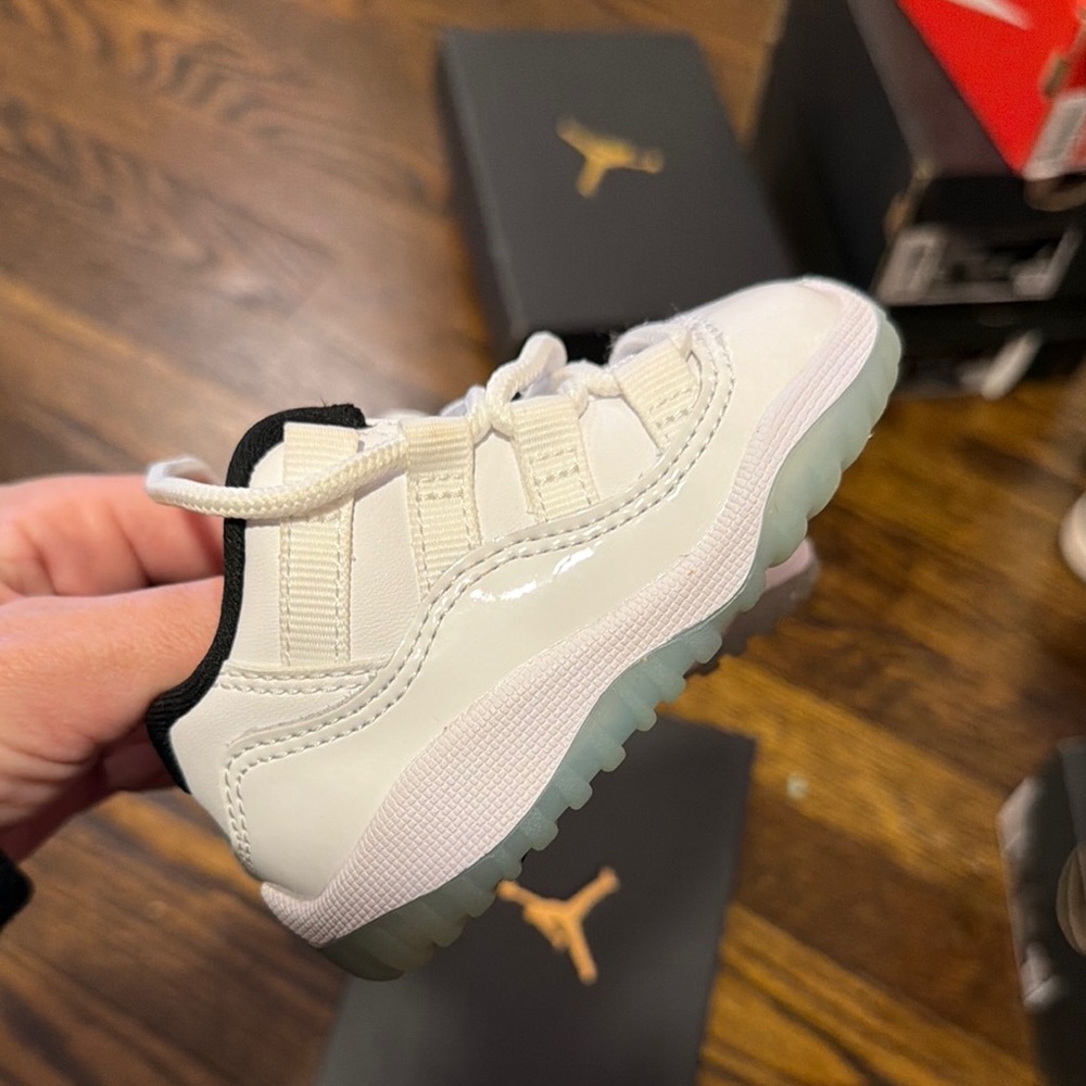 Jordan 11 Retro Low toddler White and Black Sneakers